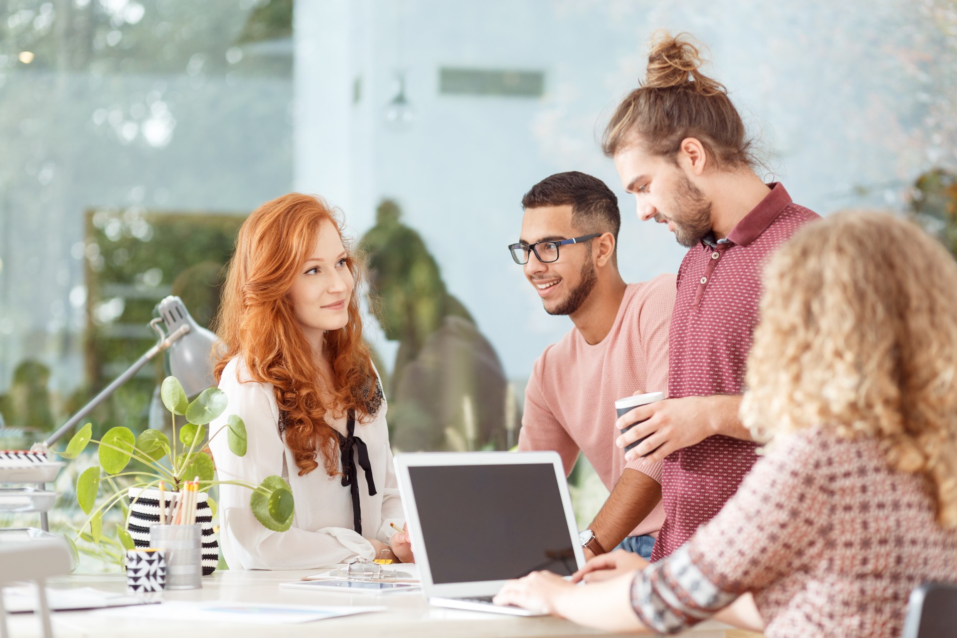 Group of young people working together